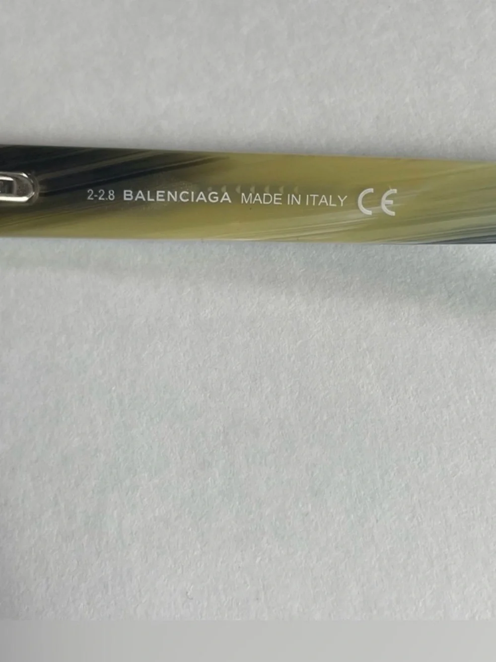 Balenciaga Black Cat-Eye Sunglasses with Brown Gradient Lenses.